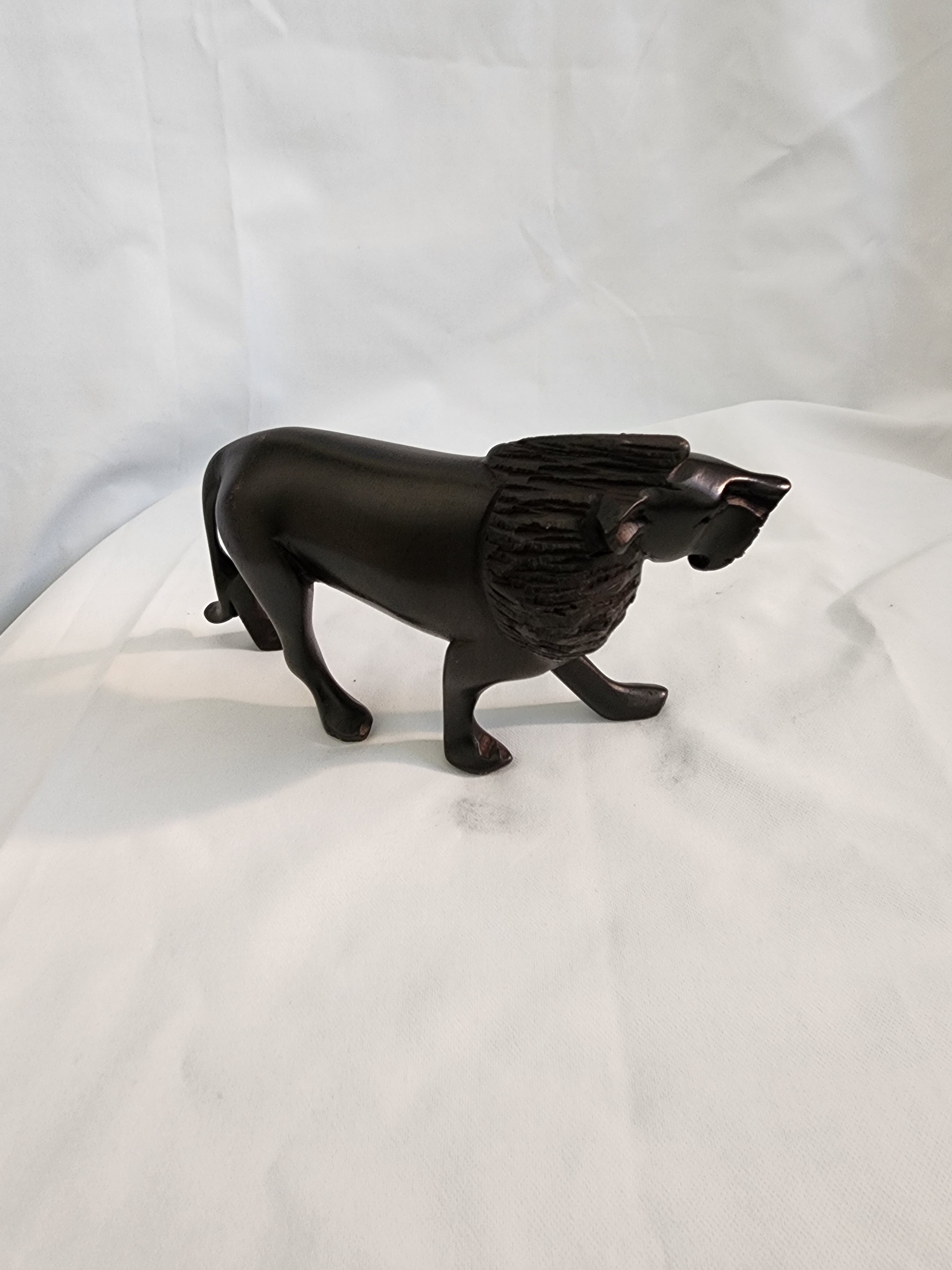 Lion hand carving